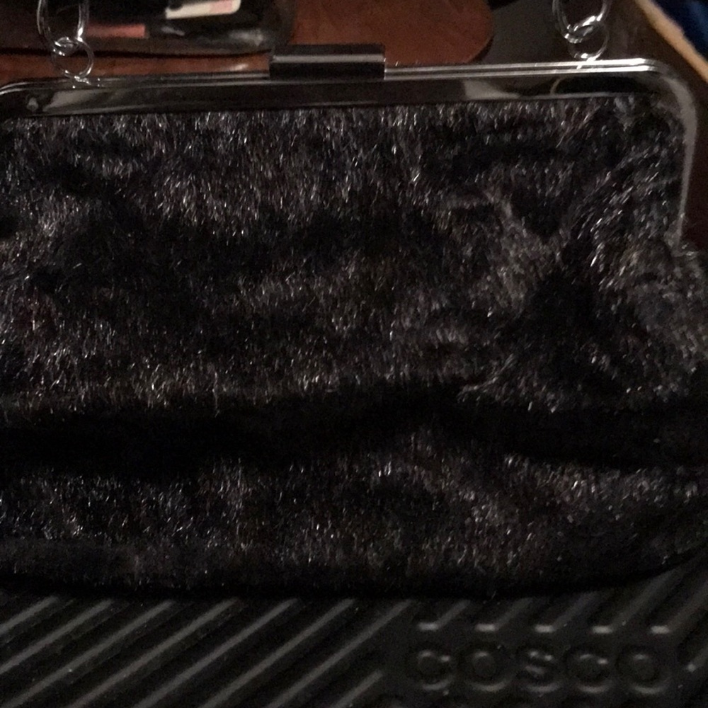 Black furry sourpuss purse